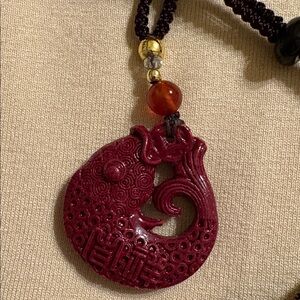Carved Fish Pendant on 24” Cord